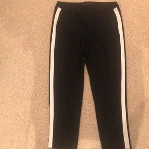 zara pants in black with white stripes on the side